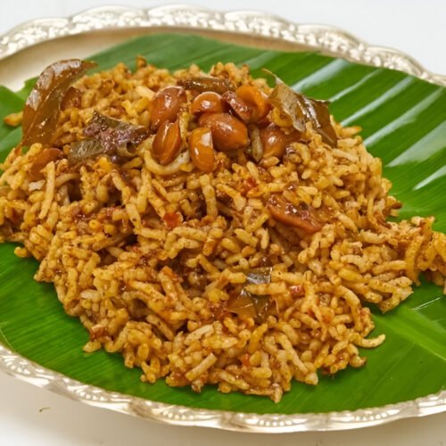 Puligare rice with Papad